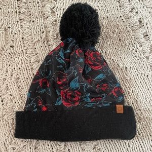 Beanie with fur ball on top